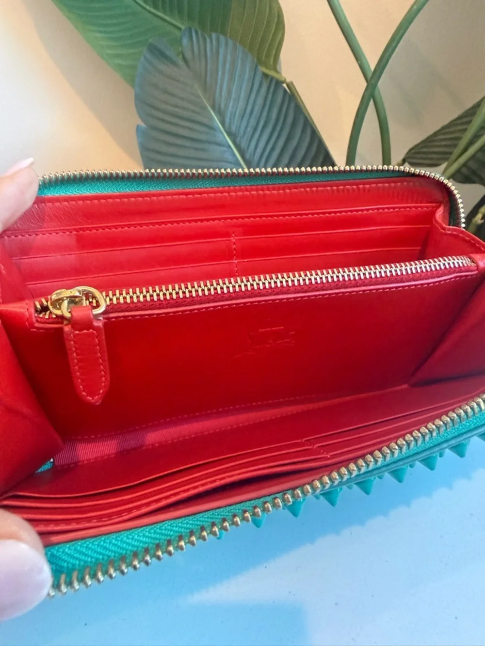 Christian Louboutin ‘Turquoise Zippy Wallet’
